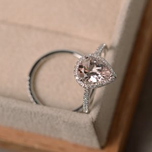 Pink morganite engagement ring, tear drop shaped, peach gemstone, sterling sivler, halo bridal ring sets | Natural genuine Array jewelry. Buy handcrafted artisan wedding jewelry.  Unique handmade bridal jewelry gift ideas. #jewelry #beadedjewelry #gift #crystaljewelry #shopping #handmadejewelry #wedding #bridal #jewelry #affiliate #ad