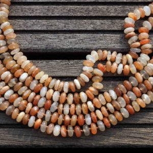 Shop Moonstone Rondelle Beads! Shiny polished Moonstone 9-10mm rondelle beads (ETB00106) | Natural genuine rondelle Moonstone beads for beading and jewelry making.  #jewelry #beads #beadedjewelry #diyjewelry #jewelrymaking #beadstore #beading #affiliate #ad