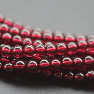 Shop Garnet Round Beads! 4mm AA Natural Garnet Beads,Smooth and Round Garnet Beads,15 inches one starand | Natural genuine round Garnet beads for beading and jewelry making.  #jewelry #beads #beadedjewelry #diyjewelry #jewelrymaking #beadstore #beading #affiliate #ad