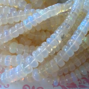 Shop Opal Rondelle Beads! 5-50 pcs / 4-7 mm, ETHIOPIAN OPAL Beads Rondelle Gemstone / AA, Smooth White Welo Opal Bead Gem Rondelles, October Birthstone Gemstone | Natural genuine rondelle Opal beads for beading and jewelry making.  #jewelry #beads #beadedjewelry #diyjewelry #jewelrymaking #beadstore #beading #affiliate #ad