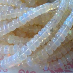 Shop Opal Rondelle Beads! 5-50 pcs / ETHIOPIAN OPAL Beads Rondelles, Luxe AA, Smooth Opal, 4-7 mm / october birthstone brides bridal weddings african gemstone gems | Natural genuine rondelle Opal beads for beading and jewelry making.  #jewelry #beads #beadedjewelry #diyjewelry #jewelrymaking #beadstore #beading #affiliate #ad