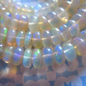 Shop Opal Rondelle Beads! 10-50 mm / OPAL Rondelles Beads, Luxe AAA, 2-3 mm, Ethiopian Welo Wello Opal, Smooth, october birthstone brides bridal weddings 23 | Natural genuine rondelle Opal beads for beading and jewelry making.  #jewelry #beads #beadedjewelry #diyjewelry #jewelrymaking #beadstore #beading #affiliate #ad