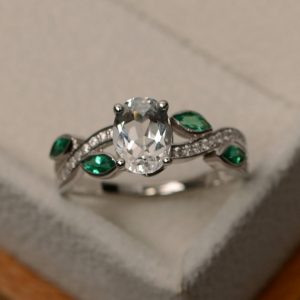 Shop Topaz Engagement Rings! Natural white topaz ring, white gemstone ring, sterling silver, leaf ring, multistone ring, engagement ring | Natural genuine Topaz rings, simple unique alternative gemstone engagement rings. #rings #jewelry #bridal #wedding #jewelryaccessories #engagementrings #weddingideas #affiliate #ad