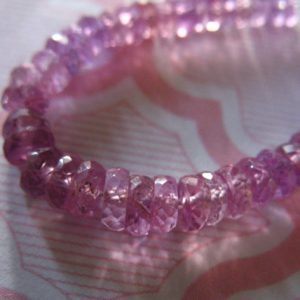 10-50 pcs / PINK SAPPHIRE Gemstone Beads Rondelle / Muted Purple Pink, Luxe AAA, 4-4.5 mm, Faceted Precious Gems / September Birthstone s tr | Natural genuine beads Gemstone beads for beading and jewelry making.  #jewelry #beads #beadedjewelry #diyjewelry #jewelrymaking #beadstore #beading #affiliate #ad