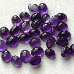Shop Amethyst Cabochons! 8x10mm – 9x11mm Amethyst Oval Plain Flat Back Cabochons, Amethyst Cabochons, Loose Amethyst Stones For Jewelry (5Pcs To 10Pcs Options) | Natural genuine stones & crystals in various shapes & sizes. Buy raw cut, tumbled, or polished gemstones for making jewelry or crystal healing energy vibration raising reiki stones. #crystals #gemstones #crystalhealing #crystalsandgemstones #energyhealing #affiliate #ad