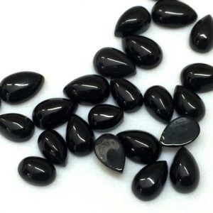 Shop Onyx Bead Shapes! 5x7mm To 6x9mm Black Onyx Plain Pear Cabochon, Black Onyx Pear, Loose Black Onyx Gem, Black Onyx Flat Back Cabochons (5Pcs To 10Pcs Options) | Natural genuine other-shape Onyx beads for beading and jewelry making.  #jewelry #beads #beadedjewelry #diyjewelry #jewelrymaking #beadstore #beading #affiliate #ad