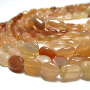 Shop Moonstone Bead Shapes! Moonstone Beads 10 X 6mm Chatoyant Peach Smooth Ovals – 16 Inch Strand | Natural genuine other-shape Moonstone beads for beading and jewelry making.  #jewelry #beads #beadedjewelry #diyjewelry #jewelrymaking #beadstore #beading #affiliate #ad