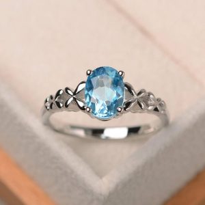 Swiss blue topaz ring, engagement ring, oval cut blue gemstone, sterling silver ring | Natural genuine Gemstone rings, simple unique alternative gemstone engagement rings. #rings #jewelry #bridal #wedding #jewelryaccessories #engagementrings #weddingideas #affiliate #ad