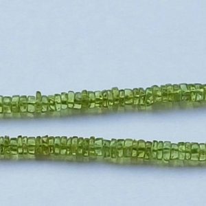 Shop Peridot Rondelle Beads! 2 strands of PERIDOT Rondelle beads 4-5mm 8" | Natural genuine rondelle Peridot beads for beading and jewelry making.  #jewelry #beads #beadedjewelry #diyjewelry #jewelrymaking #beadstore #beading #affiliate #ad