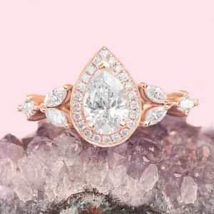 Shop Diamond Rings! Pear Diamond 1.0ct Unique Engagement Ring, Pear Diamond Halo Unique Engagement Ring, GIA certificate, Marquise side diamonds – Muse | Natural genuine Diamond rings, simple unique alternative gemstone engagement rings. #rings #jewelry #bridal #wedding #jewelryaccessories #engagementrings #weddingideas #affiliate #ad