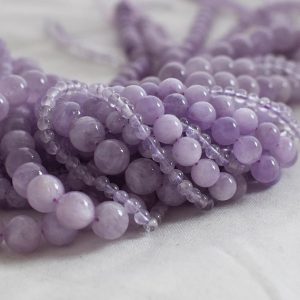 High Quality Grade A Natural Lavender Purple Mauve Jade Semi-precious Gemstone Round Beads – 4mm, 6mm, 8mm, 10mm sizes – 15.5" strand | Natural genuine round Gemstone beads for beading and jewelry making.  #jewelry #beads #beadedjewelry #diyjewelry #jewelrymaking #beadstore #beading #affiliate #ad