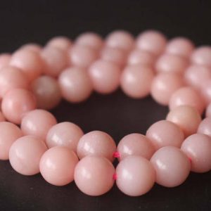 Shop Opal Round Beads! Natural Pink Opal Smooth and Round Beads,6mm/8mm/10mm/12mm Gemstone Beads supply,15 inches one starand | Natural genuine round Opal beads for beading and jewelry making.  #jewelry #beads #beadedjewelry #diyjewelry #jewelrymaking #beadstore #beading #affiliate #ad