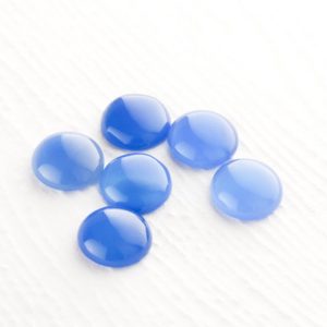 Shop Onyx Stones & Crystals! Round Blue Onyx 12mm Cabochons, 2 Pieces | Natural genuine stones & crystals in various shapes & sizes. Buy raw cut, tumbled, or polished gemstones for making jewelry or crystal healing energy vibration raising reiki stones. #crystals #gemstones #crystalhealing #crystalsandgemstones #energyhealing #affiliate #ad