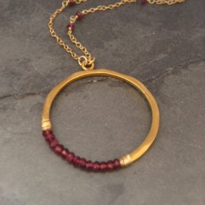 Rhodolite garnet crescent circle pendant, moon necklace, berry red faceted rondelle beaded necklace, gold and garnet | Natural genuine Array jewelry. Buy crystal jewelry, handmade handcrafted artisan jewelry for women.  Unique handmade gift ideas. #jewelry #beadedjewelry #beadedjewelry #gift #shopping #handmadejewelry #fashion #style #product #jewelry #affiliate #ad