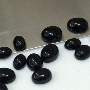Shop Onyx Cabochons! 5-7mm Black Onyx Plain Oval Cabochon, Black Onyx Flat Back Cabochons, Loose Black Onyx Gems, Black Onyx For Jewelry (5Pcs To 10Pcs Options) | Natural genuine stones & crystals in various shapes & sizes. Buy raw cut, tumbled, or polished gemstones for making jewelry or crystal healing energy vibration raising reiki stones. #crystals #gemstones #crystalhealing #crystalsandgemstones #energyhealing #affiliate #ad