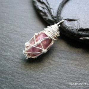 Shop Ruby Pendants! Ruby pendant, rough gemstone necklace, Cancer Zodiac, raw crystal, protective stone, July birthstone, gift for him, for her | Natural genuine Ruby pendants. Buy crystal jewelry, handmade handcrafted artisan jewelry for women.  Unique handmade gift ideas. #jewelry #beadedpendants #beadedjewelry #gift #shopping #handmadejewelry #fashion #style #product #pendants #affiliate #ad