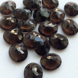 Shop Smoky Quartz Cabochons! 13mm Smoky Quartz Oval Cabochon Lot, Oval Faceted Smoky Quartz Bub Polish, Loose Smoky Quartz For Jewelry (2Pcs To 8Pcs Options) | Natural genuine stones & crystals in various shapes & sizes. Buy raw cut, tumbled, or polished gemstones for making jewelry or crystal healing energy vibration raising reiki stones. #crystals #gemstones #crystalhealing #crystalsandgemstones #energyhealing #affiliate #ad