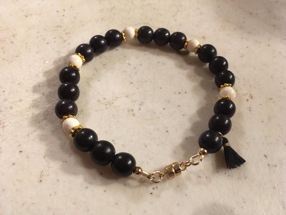 Black Bracelet - Howlite Gemstone Jewelry - Beaded Jewellery - Gold - Tassel Charm - Black And White - Handmade - Womens Gift