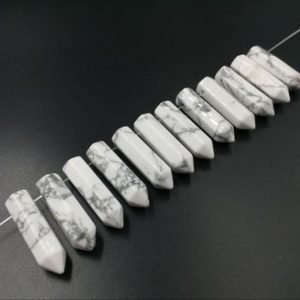 Shop Crystal Beads for Jewelry Making! 12pcs White Howlite Points Hexagonal Howlite Beads Gemstone Bullet Spike Pendant Beads supplies Semi Precious Beads | Natural genuine beads Quartz beads for beading and jewelry making.  #jewelry #beads #beadedjewelry #diyjewelry #jewelrymaking #beadstore #beading #affiliate #ad