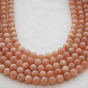 Shop Moonstone Round Beads! Natural Peach Moonstone (orange) Semi-precious Gemstone Round Beads – 4mm, 6mm, 8mm, 10mm sizes – 15" strand | Natural genuine round Moonstone beads for beading and jewelry making.  #jewelry #beads #beadedjewelry #diyjewelry #jewelrymaking #beadstore #beading #affiliate #ad