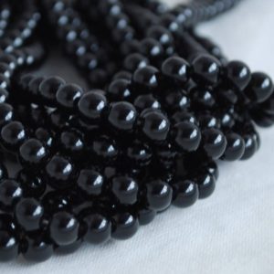 High Quality Grade A Natural Black Obsidian Semi-precious Gemstone Round Beads – 4mm, 6mm, 8mm, 10mm sizes – 15" strand | Natural genuine beads Gemstone beads for beading and jewelry making.  #jewelry #beads #beadedjewelry #diyjewelry #jewelrymaking #beadstore #beading #affiliate #ad