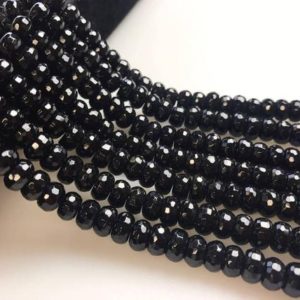 Shop Onyx Faceted Beads! Black Onyx Faceted Rondelle Beads 4x6mm 5x8mm 6x10mm 15.5" Strand | Natural genuine faceted Onyx beads for beading and jewelry making.  #jewelry #beads #beadedjewelry #diyjewelry #jewelrymaking #beadstore #beading #affiliate #ad