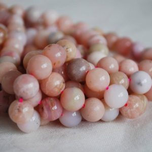 High Quality Grade A Natural Pink Peruvian Opal Semi-precious Gemstone Round Beads – 4mm, 6mm, 8mm, 10mm sizes – 15" strand | Natural genuine round Opal beads for beading and jewelry making.  #jewelry #beads #beadedjewelry #diyjewelry #jewelrymaking #beadstore #beading #affiliate #ad
