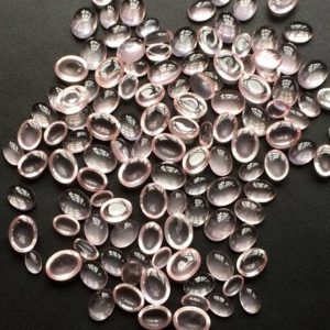 Shop Rose Quartz Cabochons! 4x6mm-7x9mm Rose Quartz Plain Oval Cabochons, Rose Quartz Flat Back Cabochons, Rose Quartz Oval Gems For Jewelry (10Pcs To 20Pcs Options) | Natural genuine stones & crystals in various shapes & sizes. Buy raw cut, tumbled, or polished gemstones for making jewelry or crystal healing energy vibration raising reiki stones. #crystals #gemstones #crystalhealing #crystalsandgemstones #energyhealing #affiliate #ad