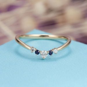Shop Sapphire Rings! Sapphire Curved wedding band  Dainty Diamond bridal Alternative Chevron Unique Promise Stacking Birthstone Matching band ring | Natural genuine Sapphire rings, simple unique alternative gemstone engagement rings. #rings #jewelry #bridal #wedding #jewelryaccessories #engagementrings #weddingideas #affiliate #ad