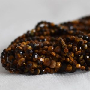 Shop Tiger Eye Faceted Beads! Grade A Natural Tiger Eye Semi-Precious Gemstone FACETED Rondelle Spacer Beads – 3mm, 4mm, 6mm, 8mm sizes –  15" strand | Natural genuine faceted Tiger Eye beads for beading and jewelry making.  #jewelry #beads #beadedjewelry #diyjewelry #jewelrymaking #beadstore #beading #affiliate #ad