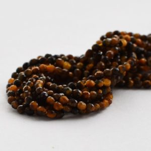 Shop Tiger Eye Faceted Beads! High Quality Grade A Natural Tiger Eye Semi-Precious Gemstone – FACETED – Round Beads – 2mm – 15" strand | Natural genuine faceted Tiger Eye beads for beading and jewelry making.  #jewelry #beads #beadedjewelry #diyjewelry #jewelrymaking #beadstore #beading #affiliate #ad