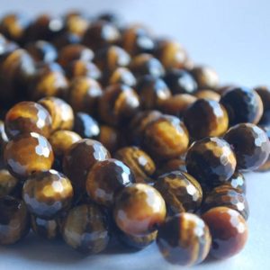 Shop Tiger Eye Faceted Beads! Tigers Eye FACETED Round Beads – 6mm, 8mm, 10mm sizes – 15" Strand – Natural Semi-precious Gemstone | Natural genuine faceted Tiger Eye beads for beading and jewelry making.  #jewelry #beads #beadedjewelry #diyjewelry #jewelrymaking #beadstore #beading #affiliate #ad