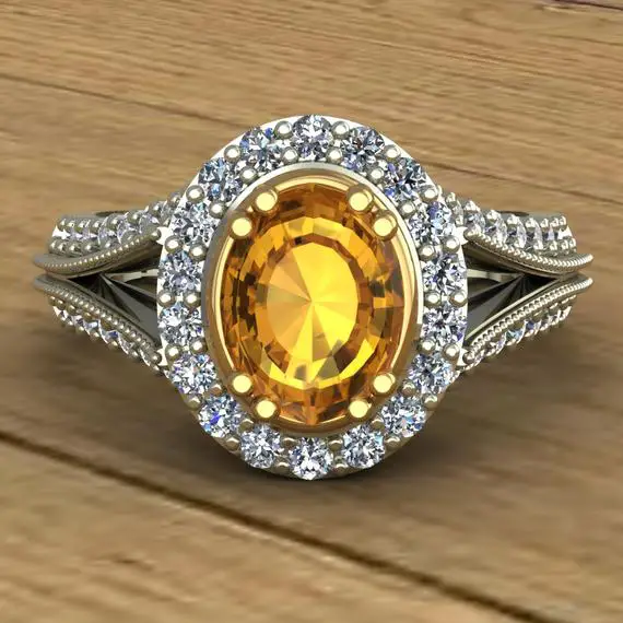 Oval Yellow Sapphire And Diamond Halo Ring With Split Shank And Yellow Scrolls In 14k Two Tone Gold - An Original Design By Charles Babb