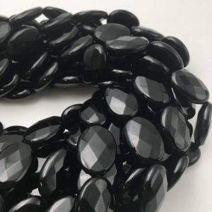 Shop Onyx Beads! Black Onyx Faceted Oval Shape Beads 10x14mm 13x18mm 15.5" Strand | Natural genuine beads Onyx beads for beading and jewelry making.  #jewelry #beads #beadedjewelry #diyjewelry #jewelrymaking #beadstore #beading #affiliate #ad