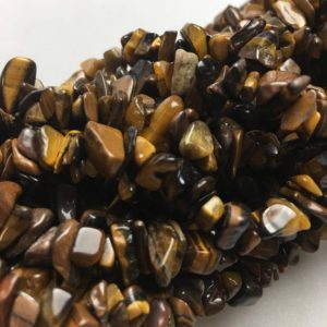 Shop Tiger Eye Beads! Tiger Eye Irregular Nugget Chips Beads 7-8mm 34" Strand | Natural genuine beads Tiger Eye beads for beading and jewelry making.  #jewelry #beads #beadedjewelry #diyjewelry #jewelrymaking #beadstore #beading #affiliate #ad