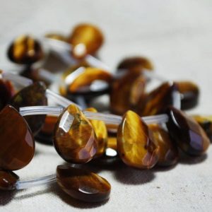 Shop Tiger Eye Bead Shapes! 10 High Quality Grade A Natural Tigerseye FACETED Semi Precious Gemstone Teardrop / Pendant Beads – 12mm, 14mm, 18mm sizes | Natural genuine other-shape Tiger Eye beads for beading and jewelry making.  #jewelry #beads #beadedjewelry #diyjewelry #jewelrymaking #beadstore #beading #affiliate #ad