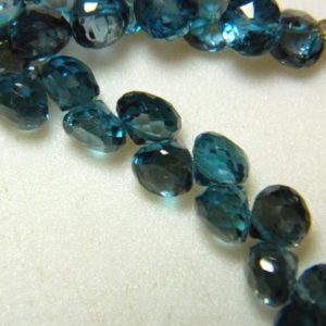Shop Topaz Bead Shapes! 7mm London Blue Topaz Beads Faceted Onion Briolette Beads, London Blue Faceted Onion Beads For Jewelry (15Pcs To 30Pcs Options) | Natural genuine other-shape Topaz beads for beading and jewelry making.  #jewelry #beads #beadedjewelry #diyjewelry #jewelrymaking #beadstore #beading #affiliate #ad