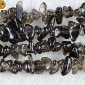Shop Smoky Quartz Chip & Nugget Beads! 35 inch strand of Smoky Quartz chip beads 5-10mm | Natural genuine chip Smoky Quartz beads for beading and jewelry making.  #jewelry #beads #beadedjewelry #diyjewelry #jewelrymaking #beadstore #beading #affiliate #ad
