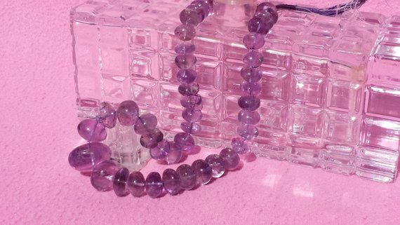 Large Amethyst Graduating Smooth Rondelle Beads 18 In. Strand, Natural Purple Amethyst, 15.5mm-29.4mm, 1000cts.