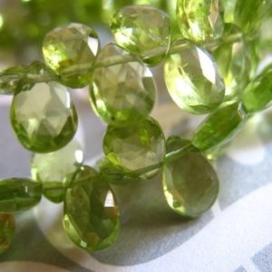 Shop Peridot Beads! Shop Sale.. .. Peridot Briolettes Pear, Luxe AAA, 6 pcs, 6-8 mm, Granny Apple Green Focals, faceted.. August birthstone 68 | Natural genuine beads Peridot beads for beading and jewelry making.  #jewelry #beads #beadedjewelry #diyjewelry #jewelrymaking #beadstore #beading #affiliate #ad