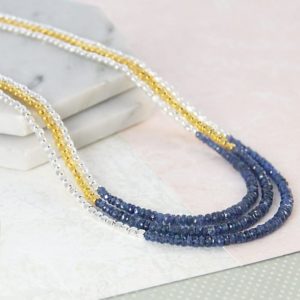 Shop Gemstone & Crystal Necklaces! Sapphire Bead Necklace September Birthstone Sapphire Birthstone Gold Necklace Embers Raw Sapphire Necklace | Natural genuine Gemstone necklaces. Buy crystal jewelry, handmade handcrafted artisan jewelry for women.  Unique handmade gift ideas. #jewelry #beadednecklaces #beadedjewelry #gift #shopping #handmadejewelry #fashion #style #product #necklaces #affiliate #ad