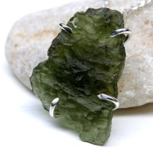 Shop Moldavite Necklaces! big Moldavite pendant, raw Moldavite necklace silver, meteorite glass pendant, rare meteorite necklace, Moldavite crystal necklace for him | Natural genuine Moldavite necklaces. Buy crystal jewelry, handmade handcrafted artisan jewelry for women.  Unique handmade gift ideas. #jewelry #beadednecklaces #beadedjewelry #gift #shopping #handmadejewelry #fashion #style #product #necklaces #affiliate #ad