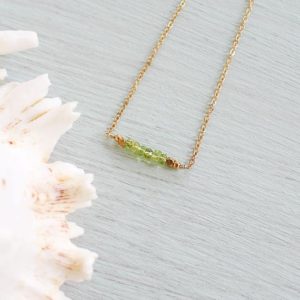 Shop Peridot Necklaces! Peridot gemstone necklace. Faceted rondelle green peridot bead bar necklace. Peridot beaded bar necklace. August birthstone necklace | Natural genuine Peridot necklaces. Buy crystal jewelry, handmade handcrafted artisan jewelry for women.  Unique handmade gift ideas. #jewelry #beadednecklaces #beadedjewelry #gift #shopping #handmadejewelry #fashion #style #product #necklaces #affiliate #ad