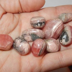 Shop Tumbled Rhodochrosite Crystals & Pocket Stones! Rhodocrosite | Natural genuine stones & crystals in various shapes & sizes. Buy raw cut, tumbled, or polished gemstones for making jewelry or crystal healing energy vibration raising reiki stones. #crystals #gemstones #crystalhealing #crystalsandgemstones #energyhealing #affiliate #ad