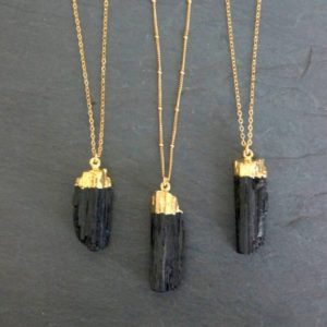 Black Tourmaline Necklace / Raw Tourmaline Necklace / Tourmaline Necklace / Gold Tourmaline Necklace / Raw Tourmaline Pendant | Natural genuine Black Tourmaline pendants. Buy crystal jewelry, handmade handcrafted artisan jewelry for women.  Unique handmade gift ideas. #jewelry #beadedpendants #beadedjewelry #gift #shopping #handmadejewelry #fashion #style #product #pendants #affiliate #ad