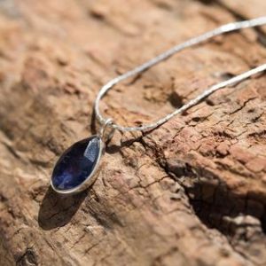 Shop Iolite Necklaces! Blue Iolite Necklace, Iolite Pendant Necklace, Iolite Necklace for Women, Blue Gemstone Pendant Necklace, Blue Teardrop Necklace | Natural genuine Iolite necklaces. Buy crystal jewelry, handmade handcrafted artisan jewelry for women.  Unique handmade gift ideas. #jewelry #beadednecklaces #beadedjewelry #gift #shopping #handmadejewelry #fashion #style #product #necklaces #affiliate #ad
