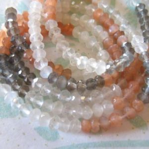 Shop Moonstone Rondelle Beads! MOONSTONE RONDELLES Beads – Luxe AAA, 4-4.5 mm, 1/2 Strand – Peach, Rainbow, Gray Grey, june birthstone wholesale true solo 45 | Natural genuine rondelle Moonstone beads for beading and jewelry making.  #jewelry #beads #beadedjewelry #diyjewelry #jewelrymaking #beadstore #beading #affiliate #ad