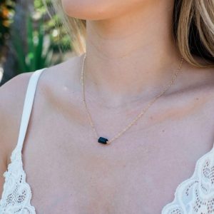 Shop Black Tourmaline Necklaces! Small raw black tourmaline crystal nugget necklace in gold, silver, bronze or rose gold – October birthstone necklace | Natural genuine Black Tourmaline necklaces. Buy crystal jewelry, handmade handcrafted artisan jewelry for women.  Unique handmade gift ideas. #jewelry #beadednecklaces #beadedjewelry #gift #shopping #handmadejewelry #fashion #style #product #necklaces #affiliate #ad