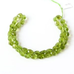 Shop Peridot Chip & Nugget Beads! Peridot Fine Faceted Tumble appx. 5 to 6×7 mm 14 Inch strand ,Green, Gemstone Bead 100% Natural, AAA gemquality | Natural genuine chip Peridot beads for beading and jewelry making.  #jewelry #beads #beadedjewelry #diyjewelry #jewelrymaking #beadstore #beading #affiliate #ad