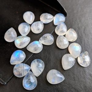 Shop Moonstone Cabochons! 7x10mm Rainbow Moonstone Plain Pear Cabochons, 5 Pcs Natural Rainbow Moonstone Pear Gemstone, Loose Moonstone Gems, Pear Cabochon – PDG121 | Natural genuine stones & crystals in various shapes & sizes. Buy raw cut, tumbled, or polished gemstones for making jewelry or crystal healing energy vibration raising reiki stones. #crystals #gemstones #crystalhealing #crystalsandgemstones #energyhealing #affiliate #ad